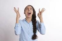 Woman looking delighted